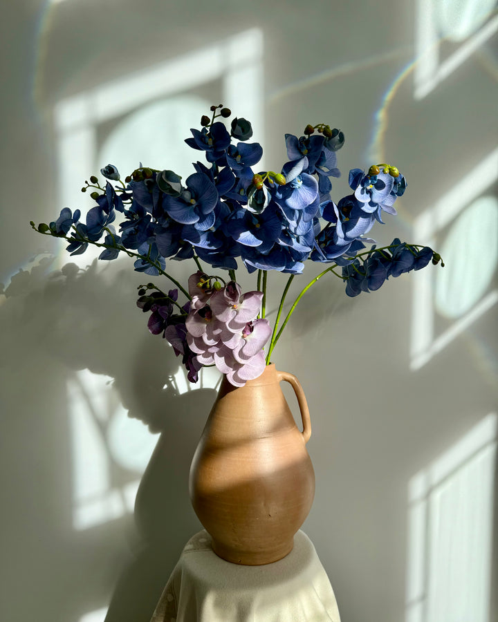 Cashmere vase and orchid